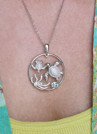 Swimming Turtles Pendant