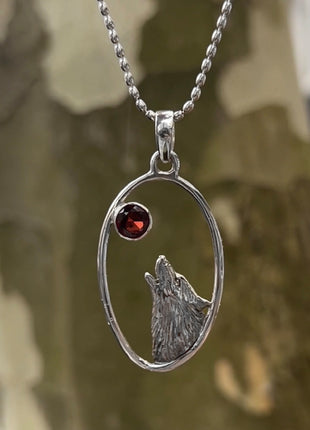 Howling Wolf & Garnet Pendant
