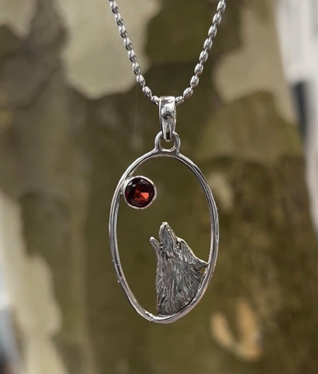 Howling Wolf & Garnet Pendant