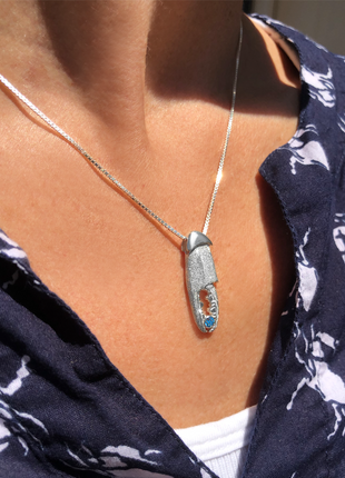 Crab Claw Blue Topaz Pendant
