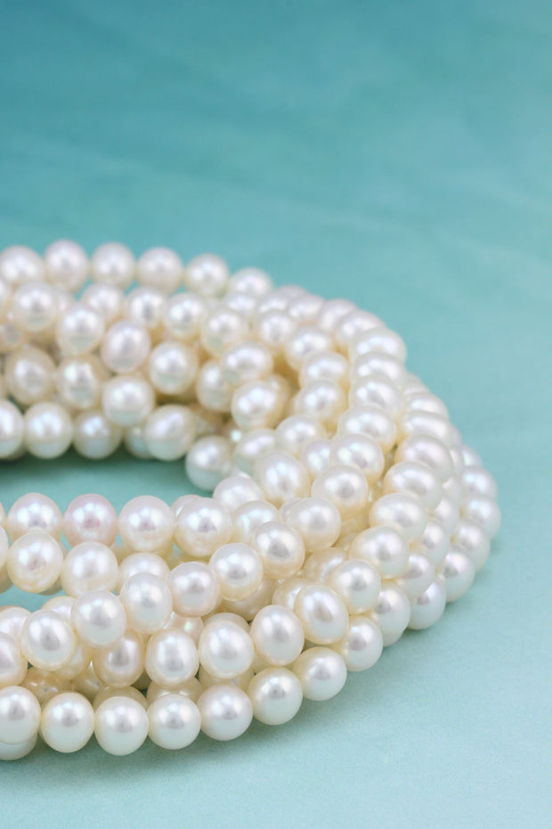 <h4>The Pearls of Promise necklaces are presented as a <em>free gift</em> to EVERY young woman graduating from EVERY high school in Talbot County, MD. They are distributed in time for graduates to wear them at commencement, and Silver Linings coordinates with each school to present the beautifully packaged pearls. The young women look forward to this very valued local tradition.</h4>